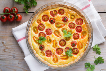 Tomato tart on wooden table