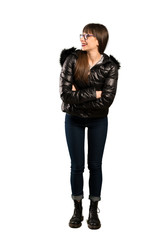 Full-length shot of Woman with glasses looking to the side