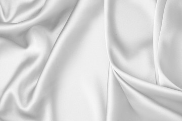 Rippled white silk fabric satin cloth waves background