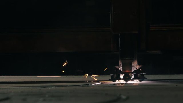 Side View Of A Laser Cutting Machine Head Cuts Off Detail
