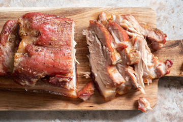 Fototapeta premium Baked carameled pork belly on a board