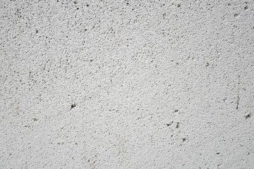 Texture of a gas concrete, concrete, brick, close up of construction material. Abstract grunge facture surface with copy space.