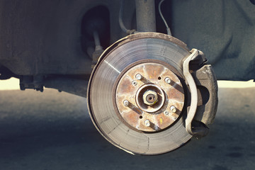A car brake disc with stopping support without wheels closeup view