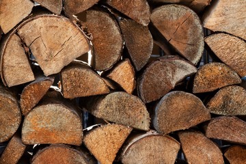 Fototapeta premium Stack of firewood - background