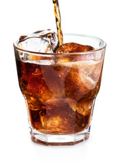 pouring cola in glass with ice isolated on white background