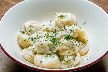 Dumplings with sour cream and herbs