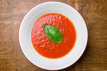 Gazpacho soup on white plate