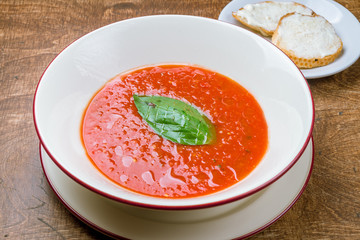 Gazpacho soup on white plate