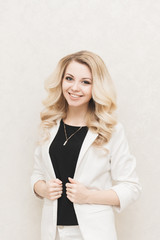 Closeup portrait of cute young business woman smiling