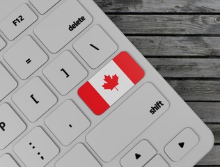 Canada flag enter key on white keyboard, on wood background. 3d render