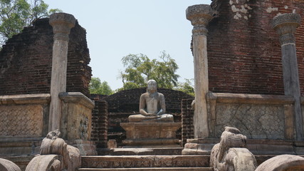 Fototapeta premium The Sacred Quadrangle with buddha, Ancient ruins Sri Lanka, Unesco ancient city Polonnaruwa, Sri Lanka
