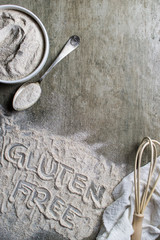 gluten free buckwheat flour bowl with spoon and whisk