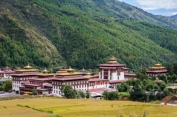 Fototapeta na wymiar Tashichho Dzong, also known as the Dzong of Thimphu, in Thimphu the capital of Bhutan. Dzongs are fortress like buildings which house a monastery and governmental office rooms.