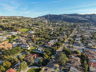 Aerial view of La Jolla little coastline city with nice beautiful wealthy villas with swimming pool. La Jolla, San Diego, California, USA.  West coast real estate development.