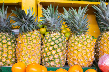 pile of pineapples in the market