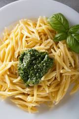 Classical italian trofie pasta with pesto sauce