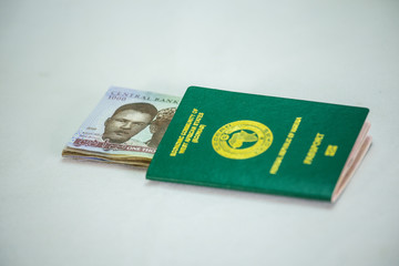 Ecowas Nigeria International Passport with 1000 naira currency notes