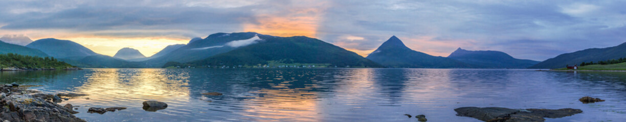 colorful sunset over the fjord on Senya island in Norway