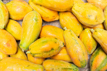 pile of papayas in the market