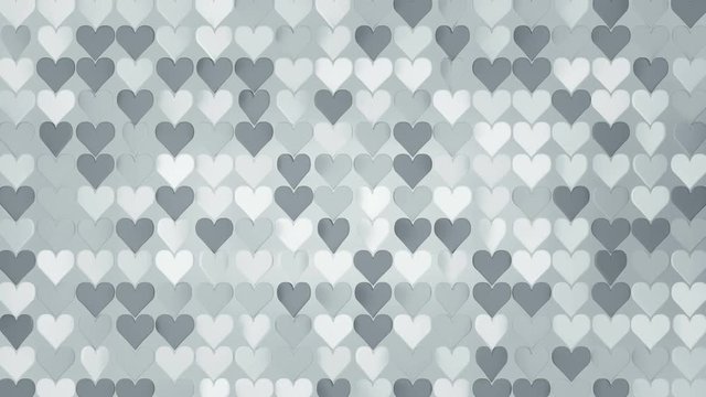 Array of white heart shapes. Abstract romantic motion background. Seamless loop 3D render animation 4k UHD 3840x2160