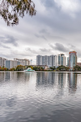 Fototapeta premium ORLANDO, FLORIDA, USA - DECEMBER, 2018: Eola Lake Park, popular destination for festivals, concerts, fundraising walks and even weddings.