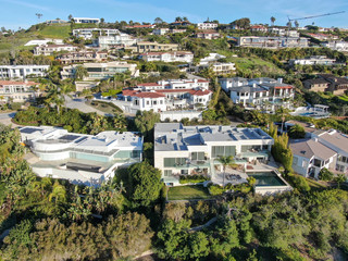 Aerial view of La Jolla little coastline city with nice beautiful wealthy villas with swimming...