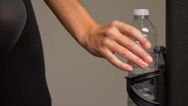 Plastic water bottle returned in holder