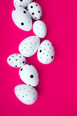 Easter eggs on pink background. Happy Easter card. Copy space