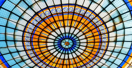 Stained Glass Dome Ceiling. Sanctuary church ceiling dome with soft lighting.