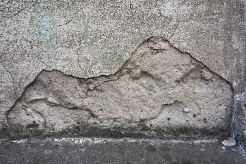 cracked color on a wall outside