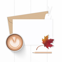 Flat lay top view elegant white composition letter kraft paper envelope pencil autumn maple leaf coffee and tag on wooden background