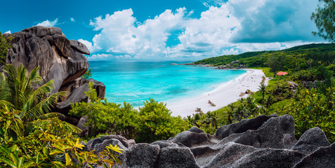Panoramic view of most spectacular tropical beach Grande Anse on La Digue Island, Seychelles. Vacation holidays relaxing concept - obrazy, fototapety, plakaty