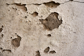 cracked color on a wall outside