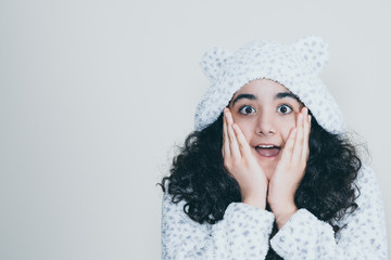 Surprised hooded girl