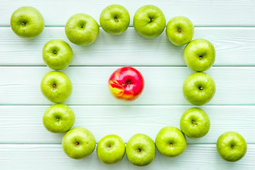 summer fruit pattern with apples on light wooden background top view copyspace