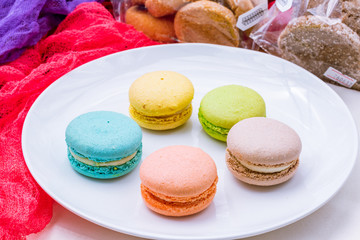 multicolored macaroons in plate