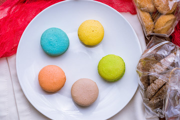 multicolored macaroons in plate