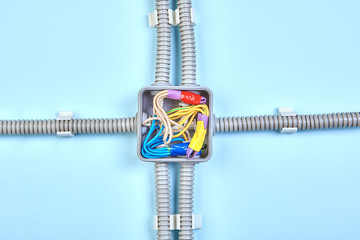 Junction box for electrical wires, close up.