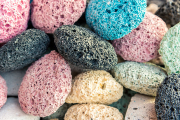 Multi-colored pumice stones for the whole frame. Selective focus