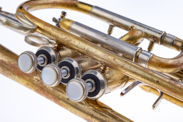 Naklejka premium An old trumpet covered with patina. Musical wind instrument.