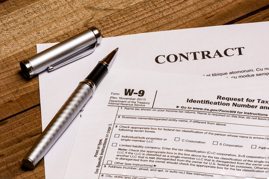 IRS form W-9 and a contract