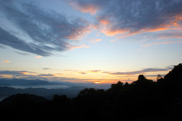sea fog in the hills with beautiful sky background
