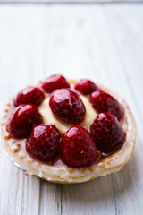 dessert background. delicious raspberry vanilla cream cheese  berry tart. sweet treat, confectionery, traditional recipe