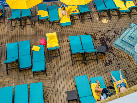 People sunbathing on cruise ship deck
