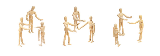 Business Unity and Teamwork Concept : Group of wooden figure mannequin talking and discussion together.