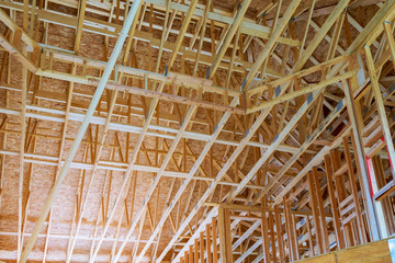 Interior framing beam of new house under construction home framing