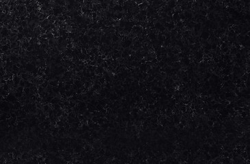 Obraz premium Black marble texture for kitchen. Textured floor surface in the house. The background of the black stone, marble for interior design.