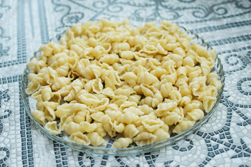 boiled pasta, cooked without anything, pasta background, food for children