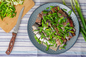 Herring fillet with green onions