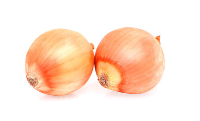 Two bulbs of brown onion isolated on white background with clipping path..